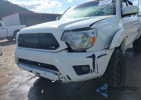 2015 Toyota Tacoma Base V6 z USA, uszkodzony, nr VIN 5TFLU4EN4FX127928